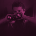 Shia LaBeouf looking through binoculars in Disturbia