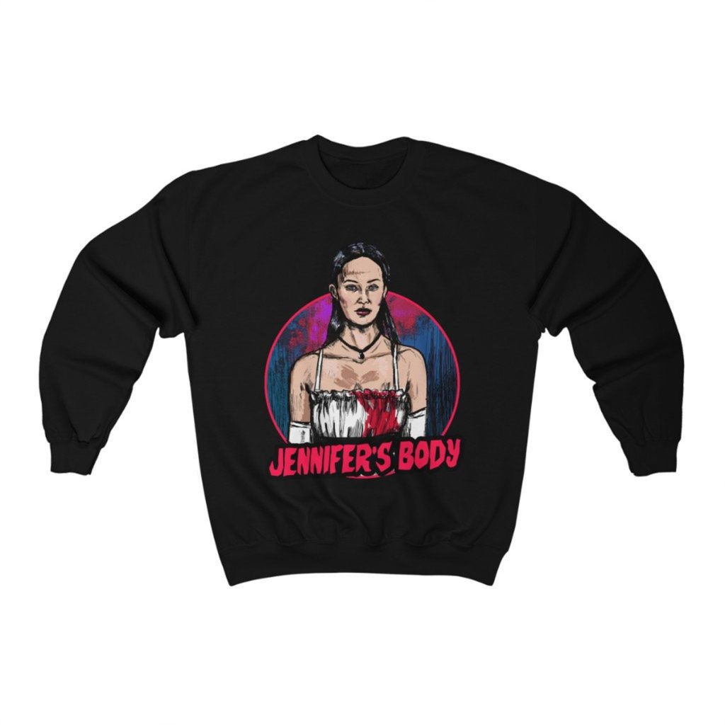 Product photo of black crew neck sweatshirt with retro illustration of Jennifer Check (Megan Fox) from Jennifer's Body with movie title below